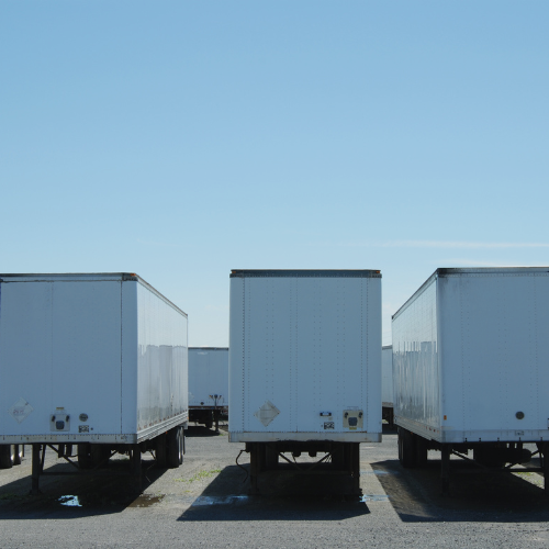 3 dry van trailers parked next to one another, Dock & Transfer, Grand Rapids, Michigan.